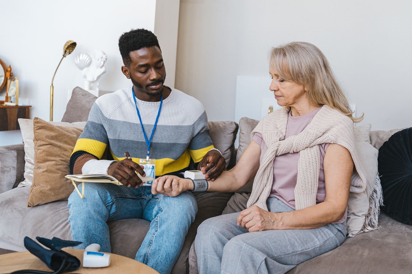 Hospice caregiver reviewing a patient's care notes